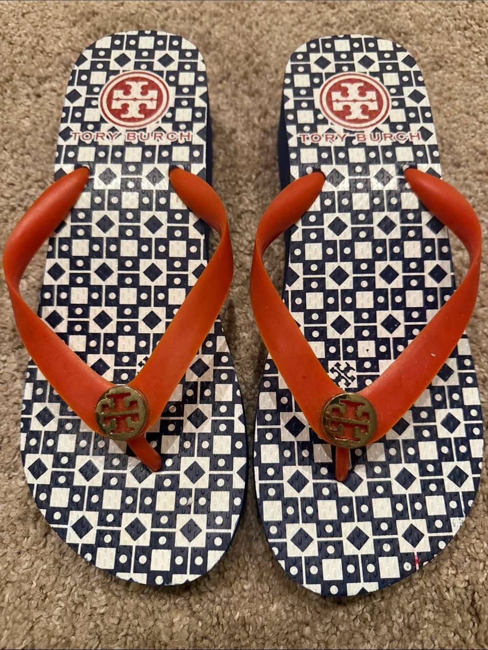 Tory Burch Orange Strap Logo Thong Sandals with Navy Geometric Footbed